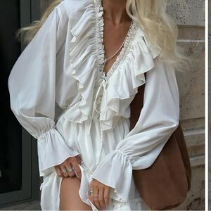 Brand new never worn ruffle white dress